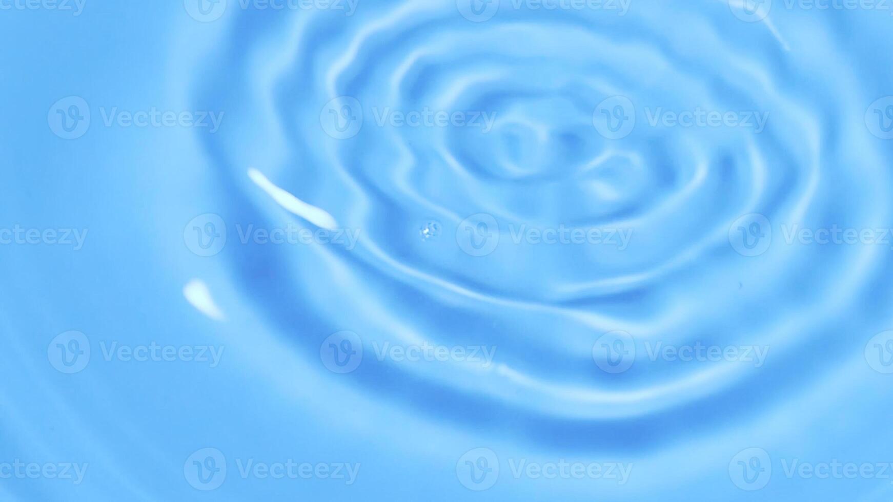 Tranquil Blue Water Ripple Creating Soothing Patterns in a Serene Minimalist Setting photo