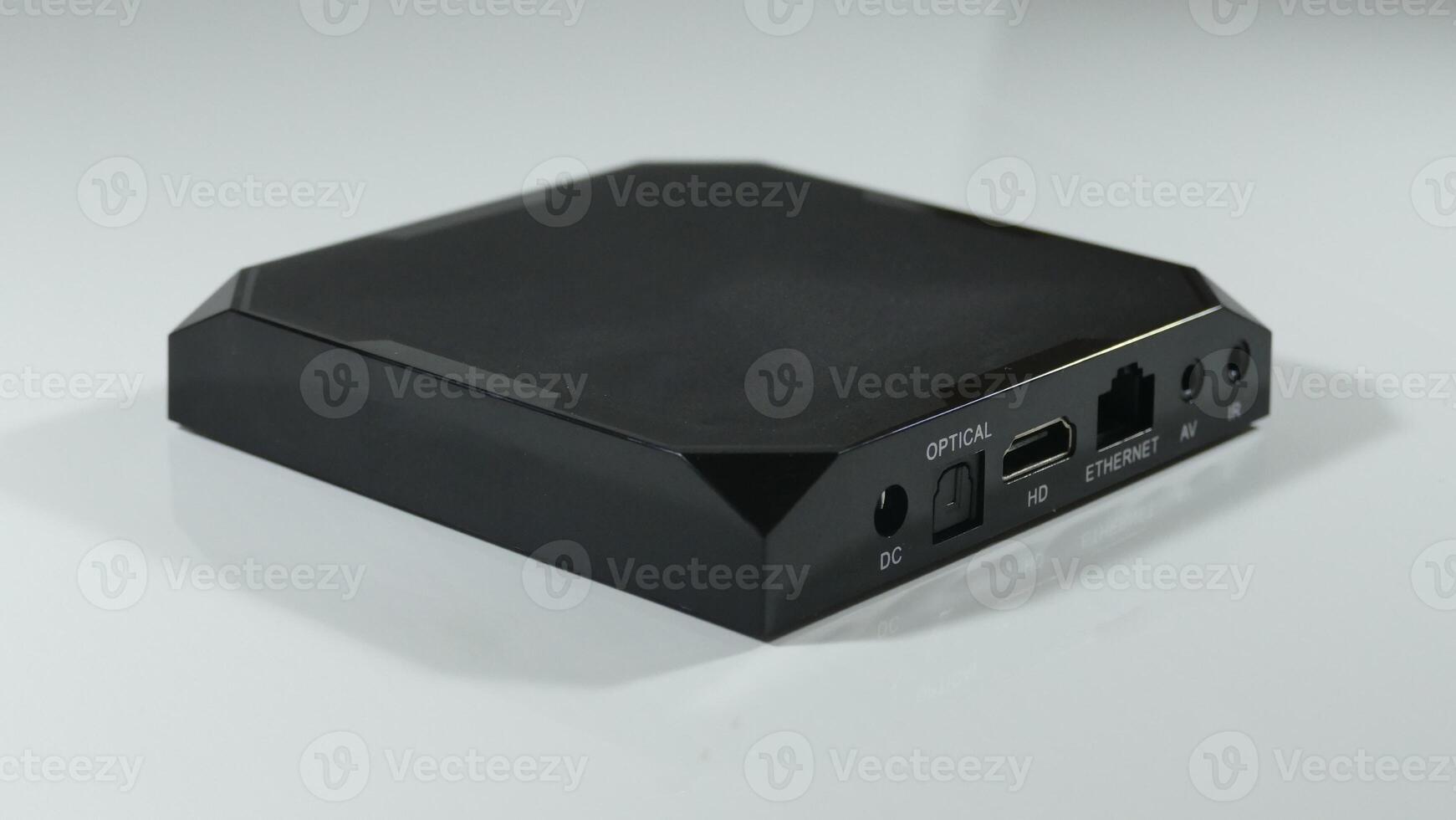 USB connectors, power and Ethernet sockets on a side panel of new TV box photo