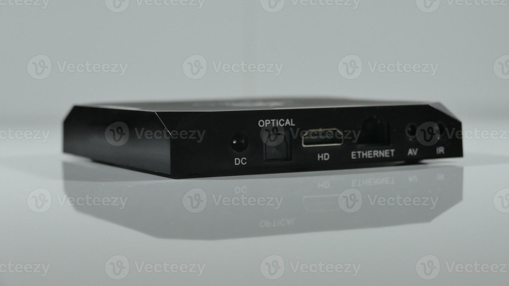Flat TV set-top box with HDMI, power and network sockets photo