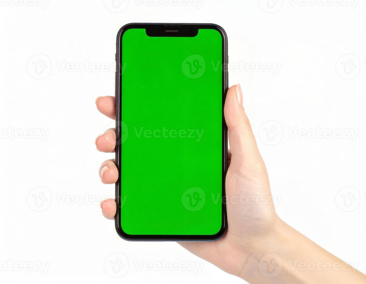 Hand holding a phone with a blank green chroma key screen for digital templates on white photo