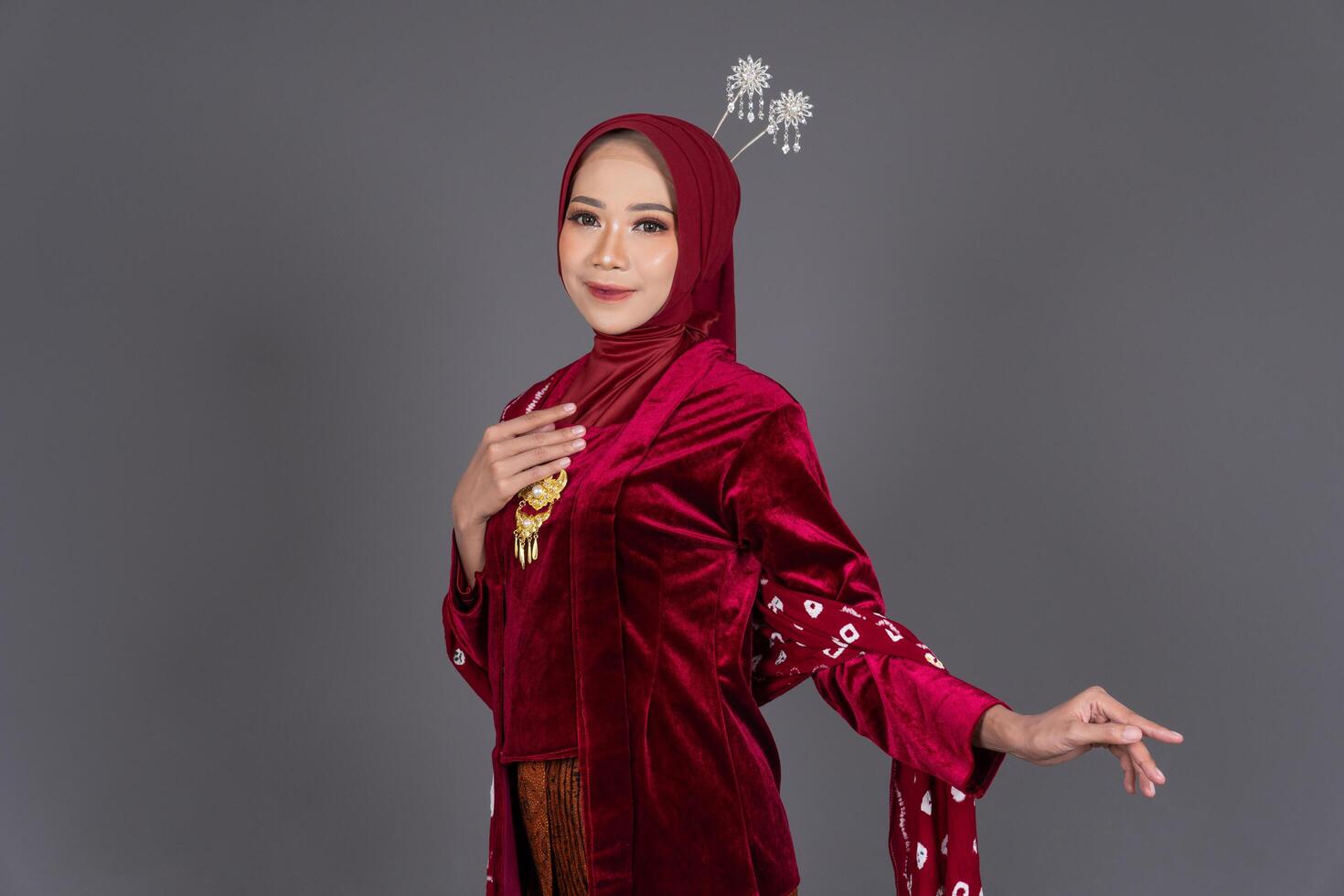 Smiling Hijab Woman Wearing Elegant Kebaya Traditional photo