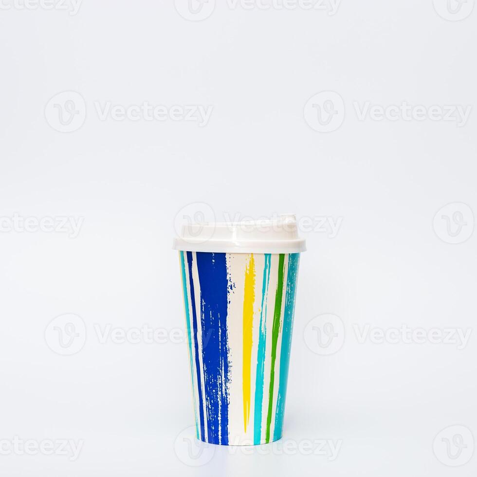 Colorful paper cup or container for coffee or cocktail on white Bright summer package for beverage. photo
