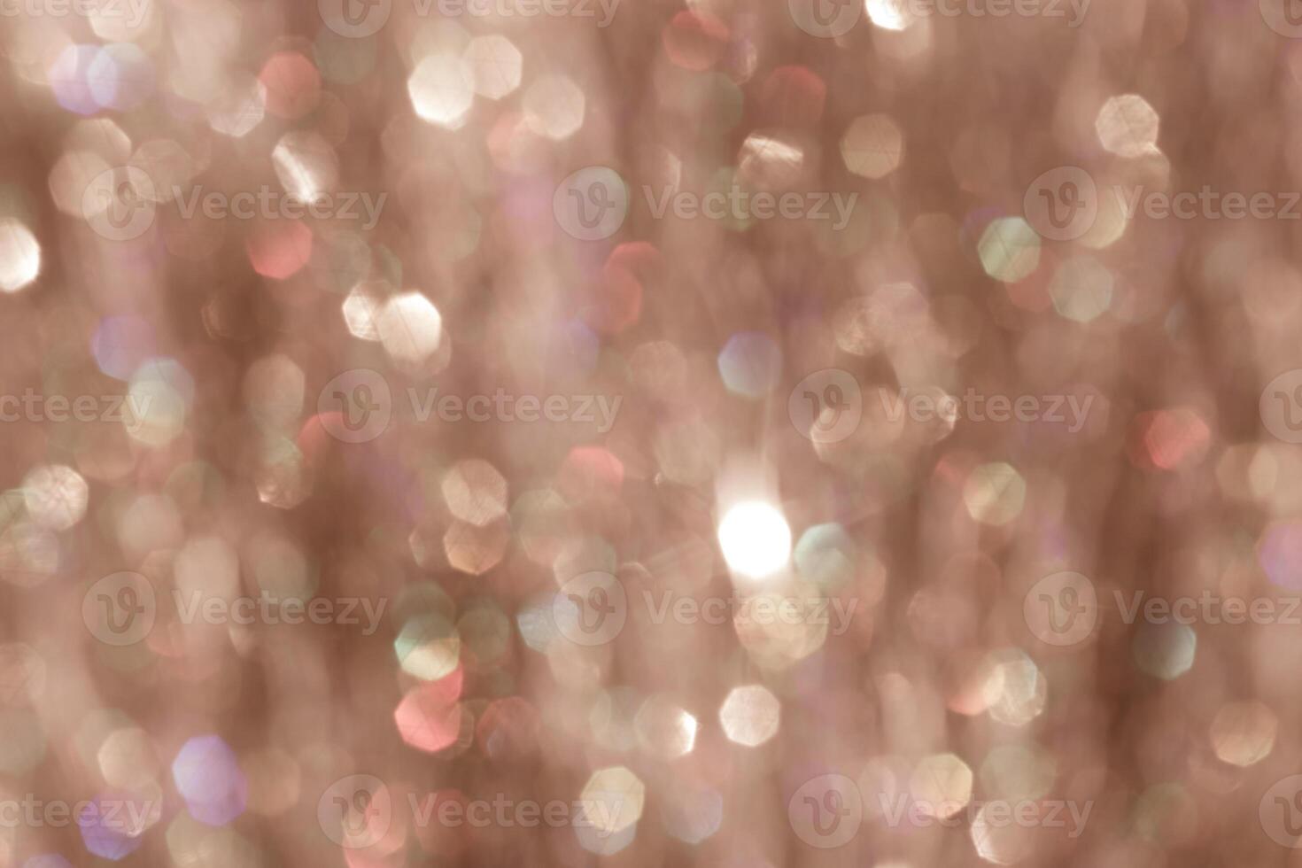 Vibrant abstract image with soft-focus mocha mousse bokeh light patterns with shimmering highlights, festive texture background, blurred backdrop trend color year 2025, sunlight glare on brown beige photo