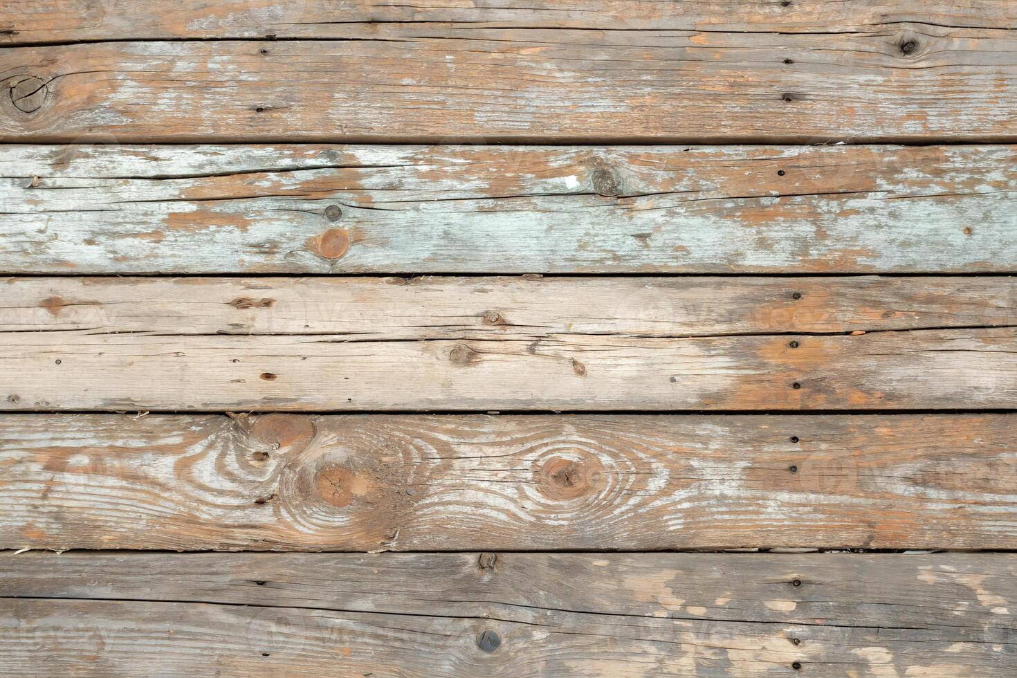 Rustic Weathered Wooden Planks with Faded Paint photo