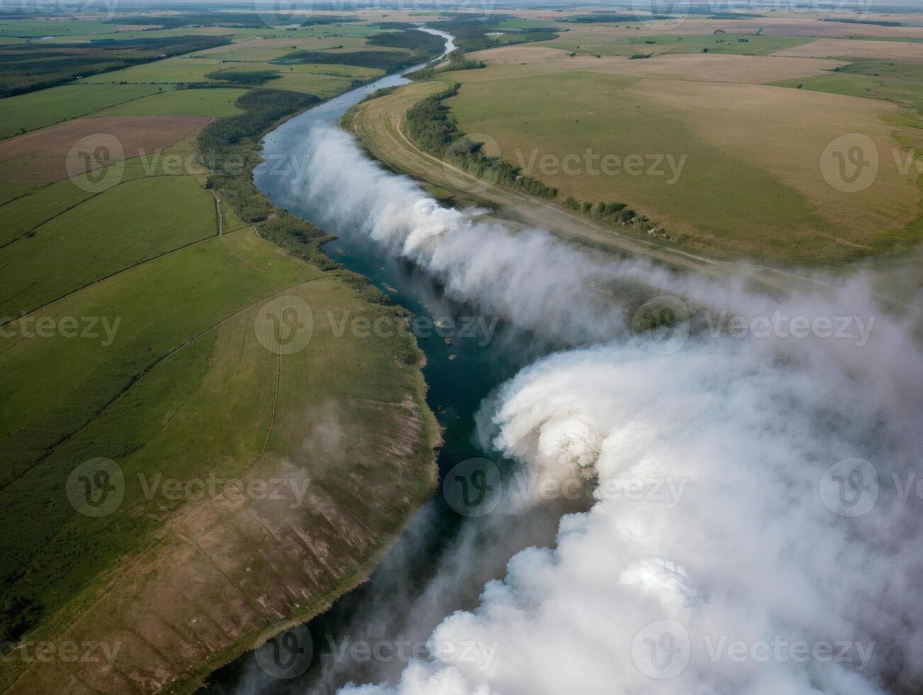 Aerial View of River Delta with Dramatic Cloud Patterns photo