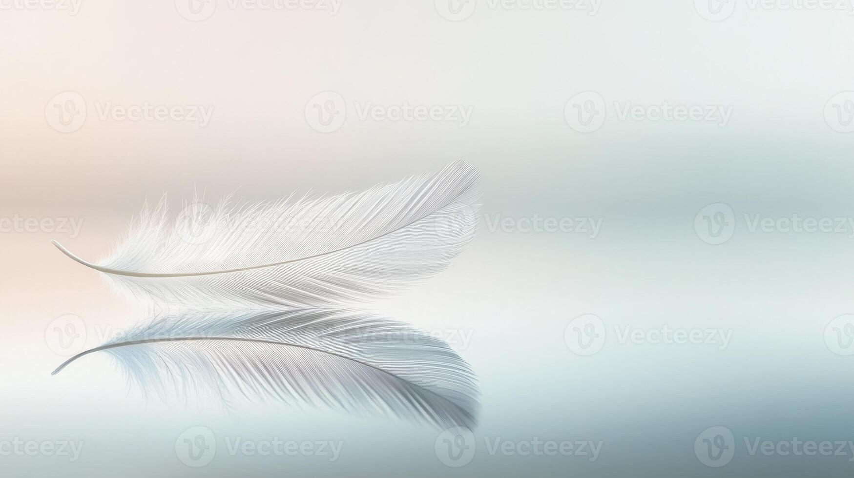 A delicate feather glides over a mirrored surface, reflecting an enchanting alternate reality below photo