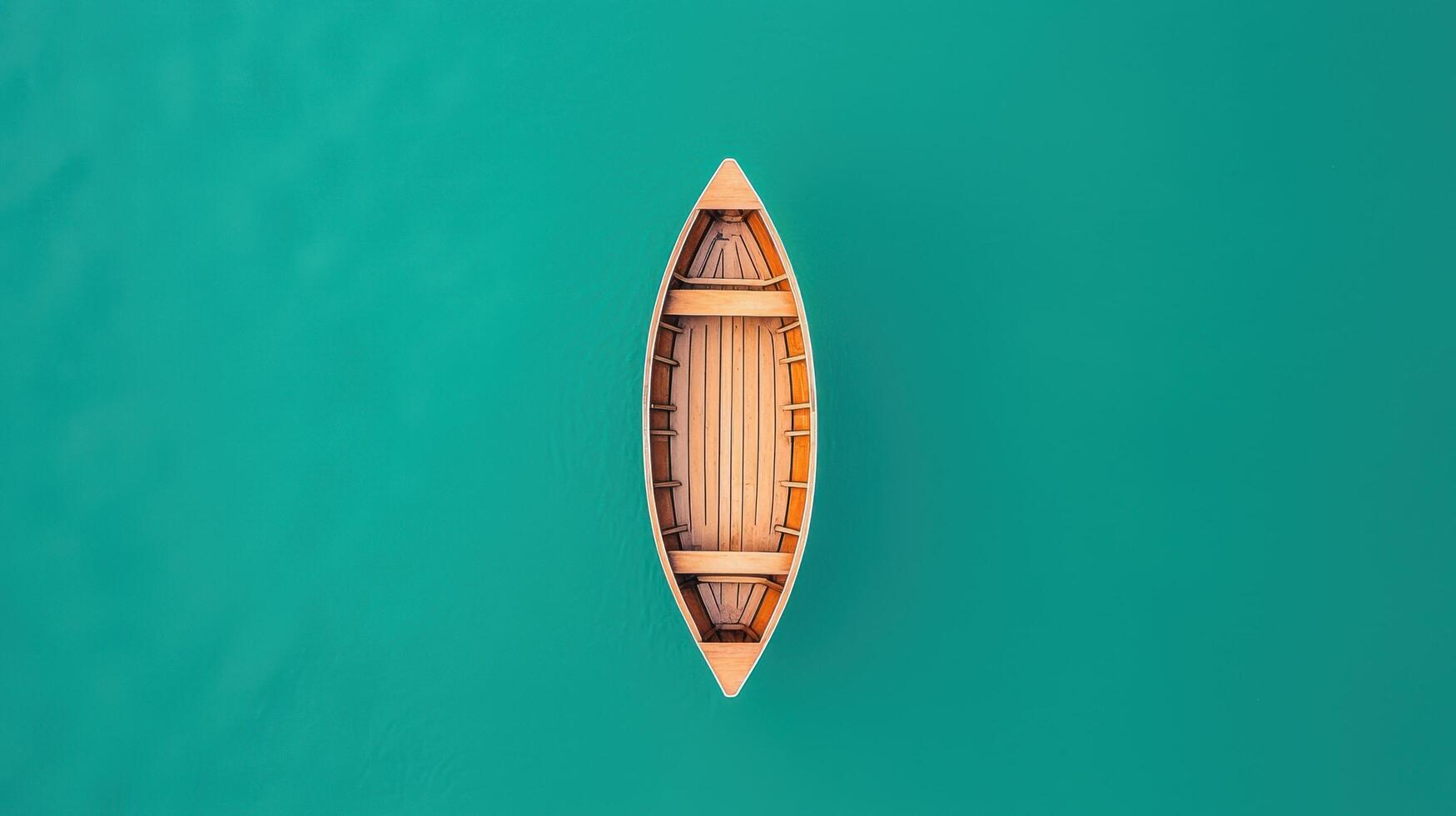 Aerial view of a small boat floating in turquoise water tropical paradise nature scene photo