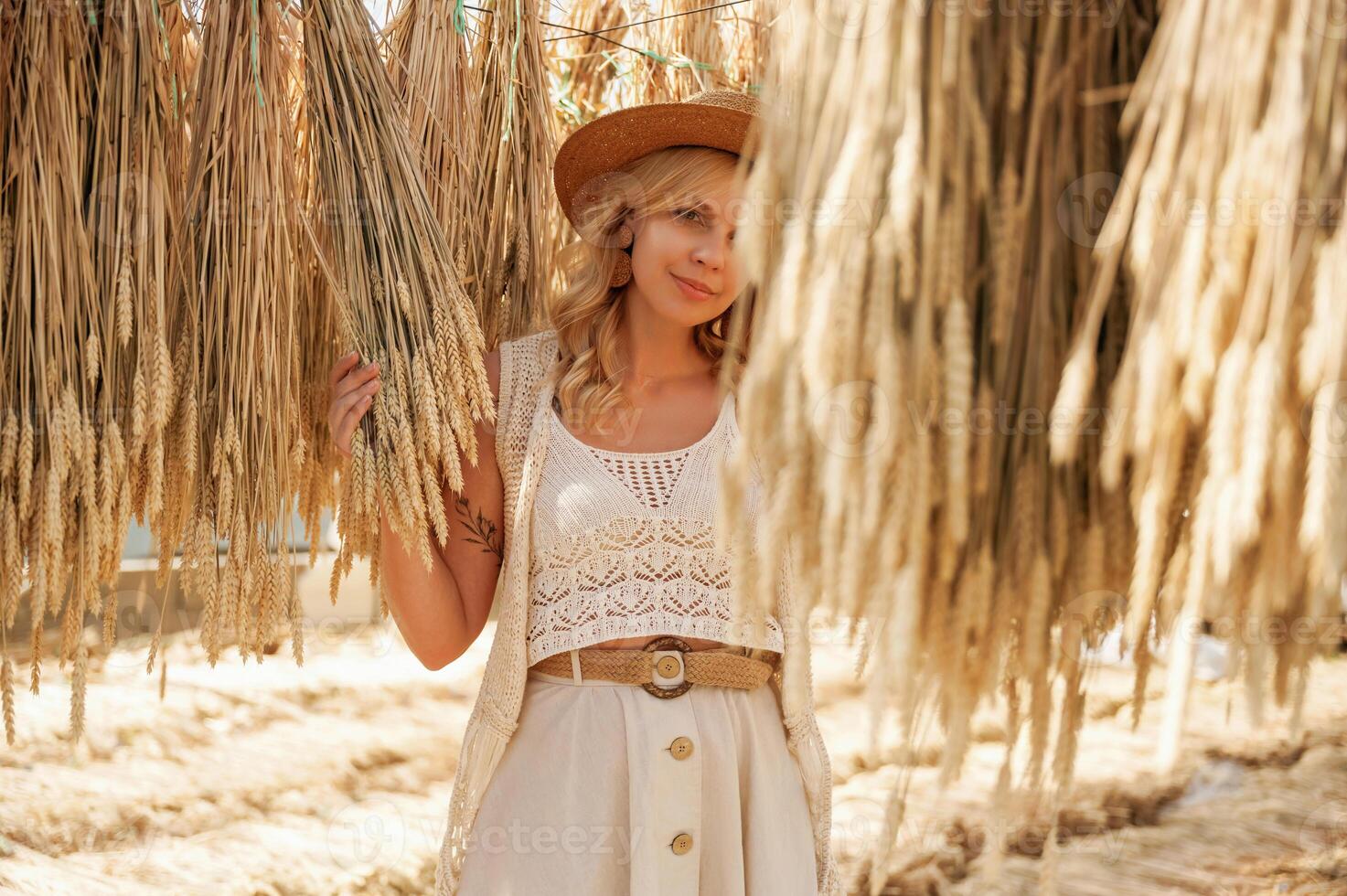Bunch, of ,dried ,plants.,, Beautiful woman is in the greenhouse photo
