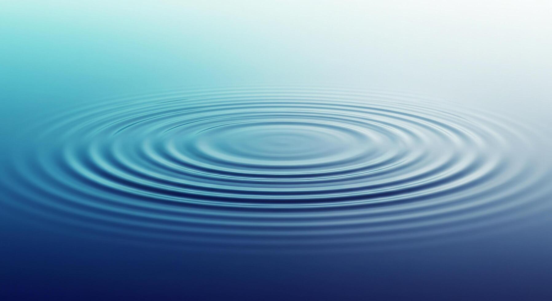 Water Ripple Effect with Soft Blue Tones and Circular Wave Patterns photo