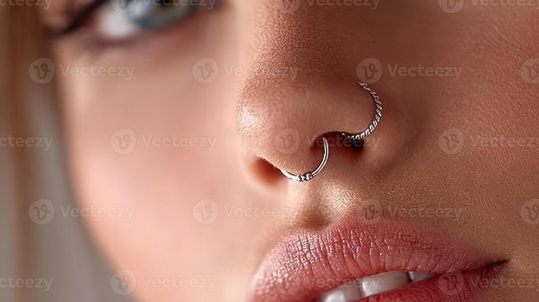 Close-up of a person showcasing multiple nose piercings in a modern aesthetic setting during daylight photo