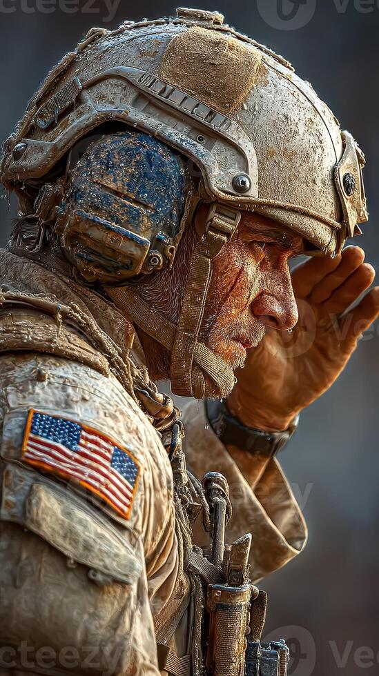 Soldier saluting with pride after a gritty mission in a challenging environment at dawn photo