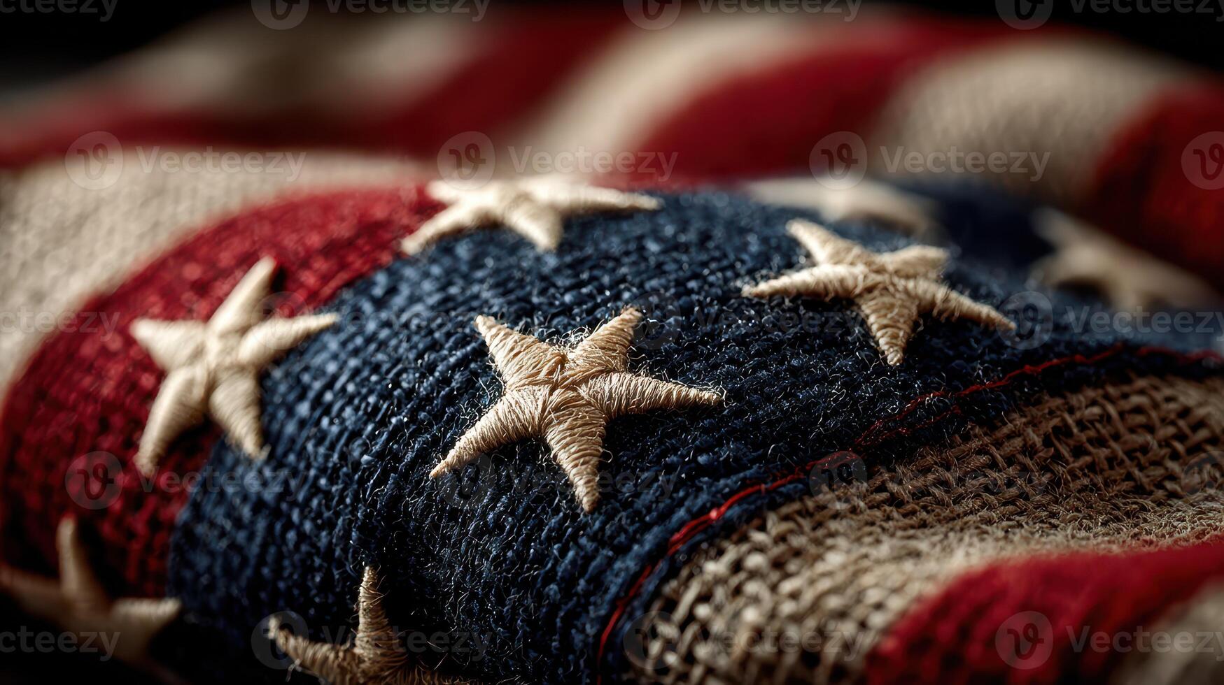Detailed view of a worn American flag showing intricate stitching and vibrant colors in a warm setting photo