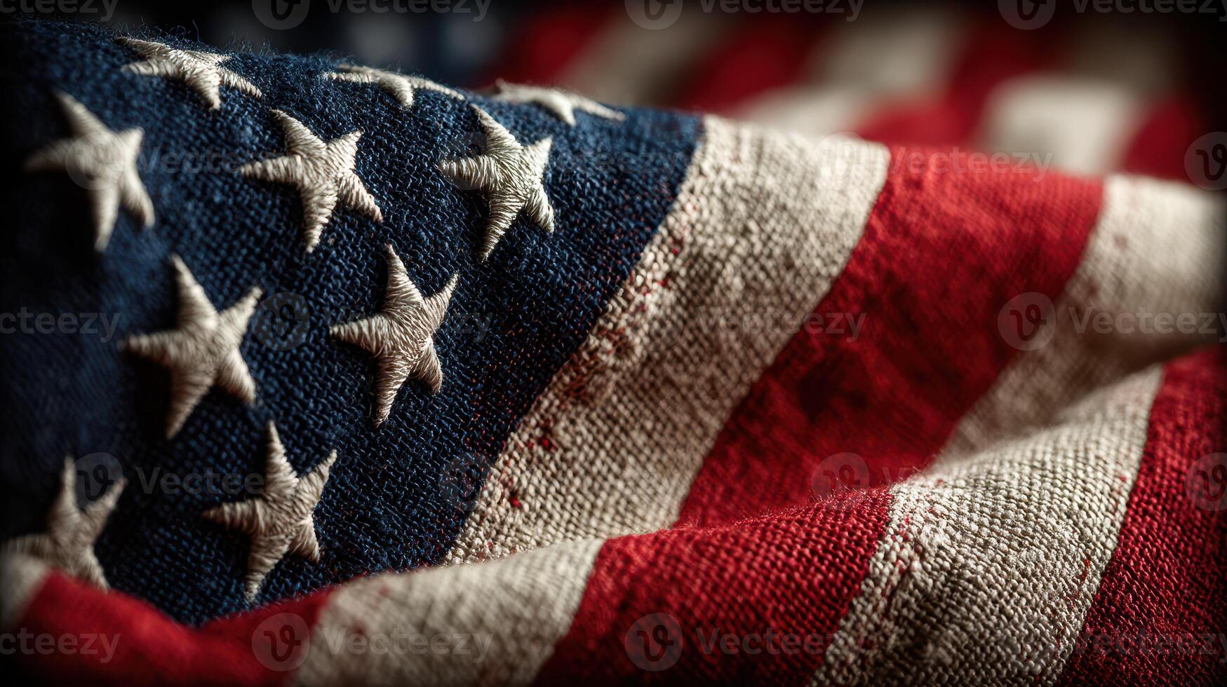Waves of color and texture in a close-up of a worn American flag displaying pride and history photo
