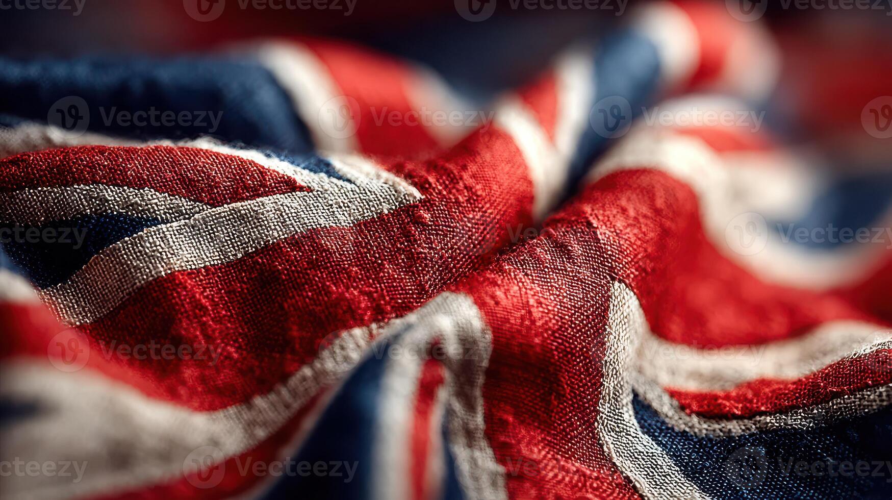 Close-up view of a textured UK flag showing vibrant colors and intricate fabric details in soft lighting photo