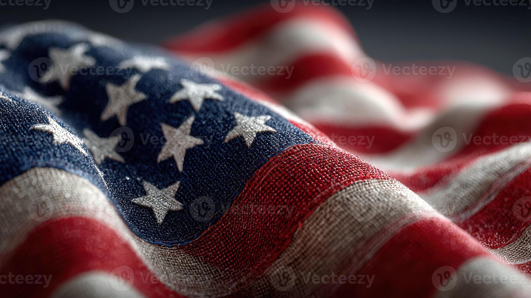 American flag draping gracefully in soft light showcases patriotism and texture in a close-up view photo