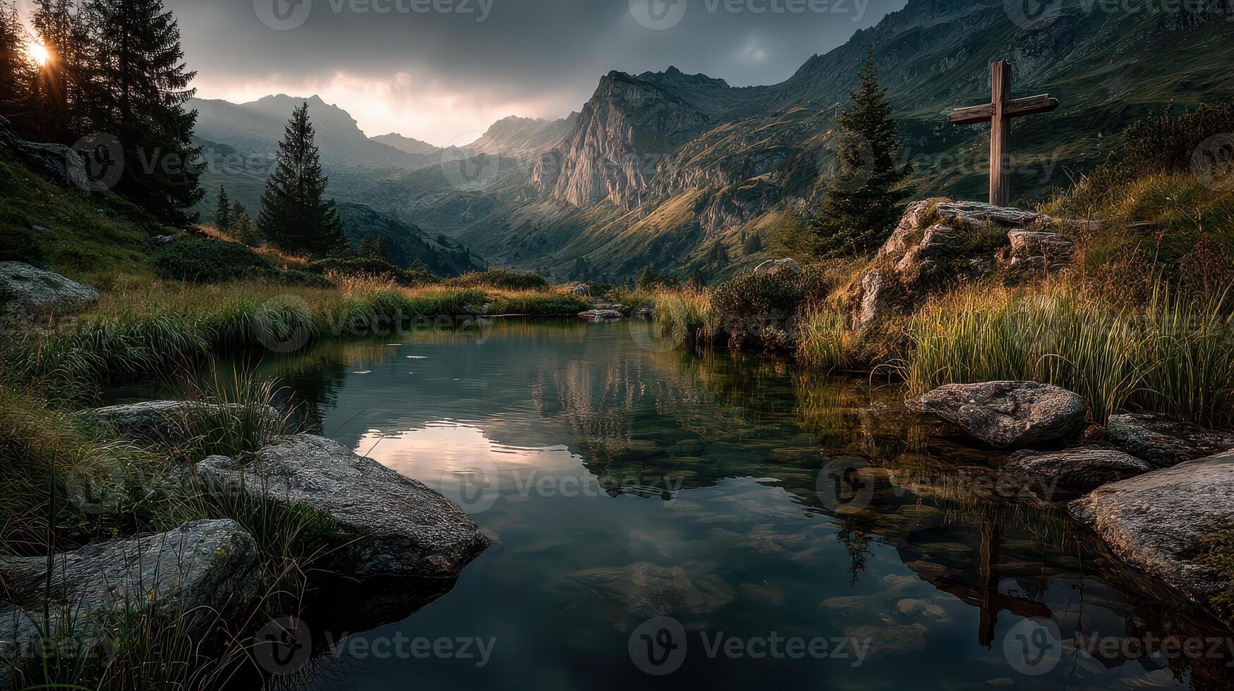 Majestic mountain landscape with serene water reflection during sunset in a quiet valley photo