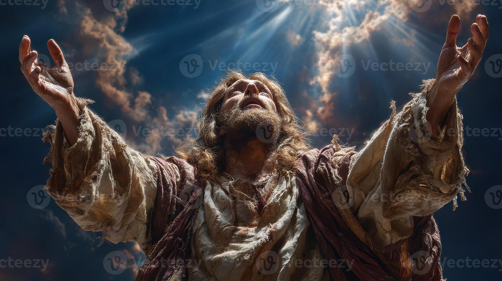 Religious figure expressing emotion with open arms under a dramatic sky at sunset photo