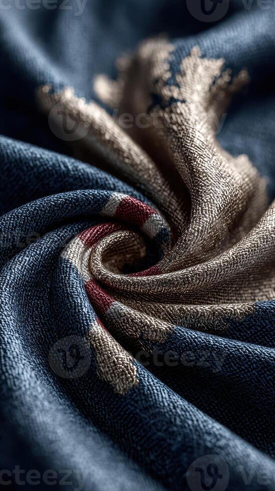 Intricate swirl of textile fabric showcasing deep blue and metallic gold colors photo
