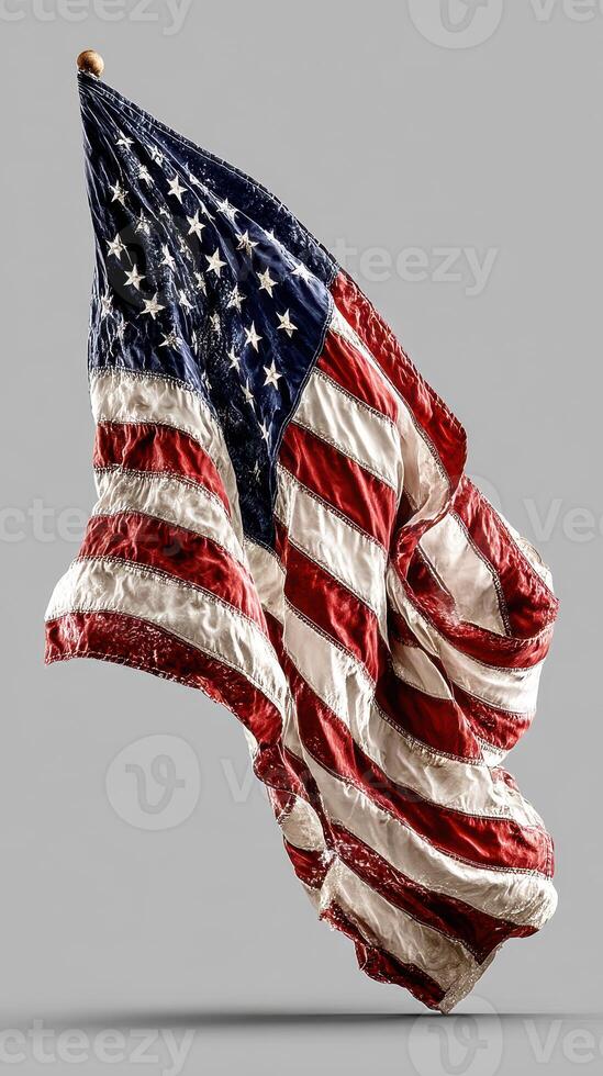 Waving American flag captured in mid-air with a textured surface and vibrant colors photo