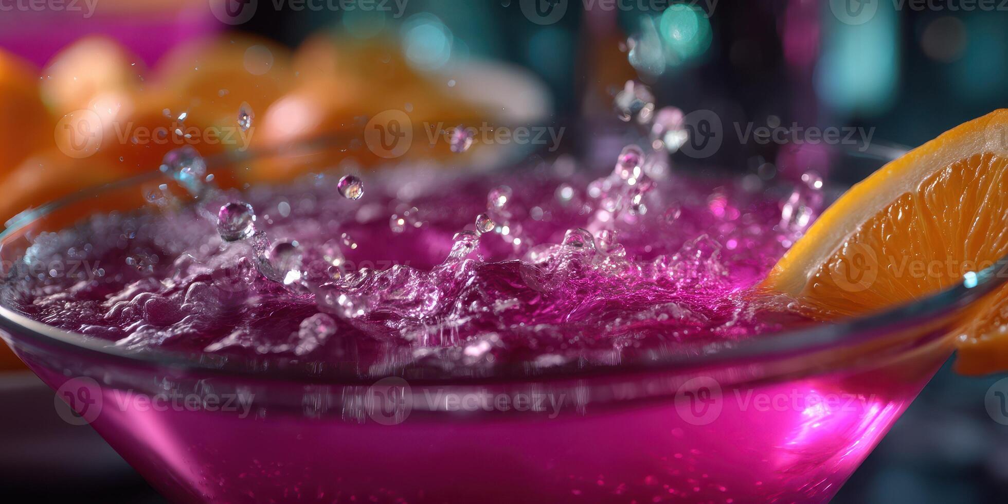 Vibrant pink drink with orange slice in a glass at a lively gathering during evening hours photo
