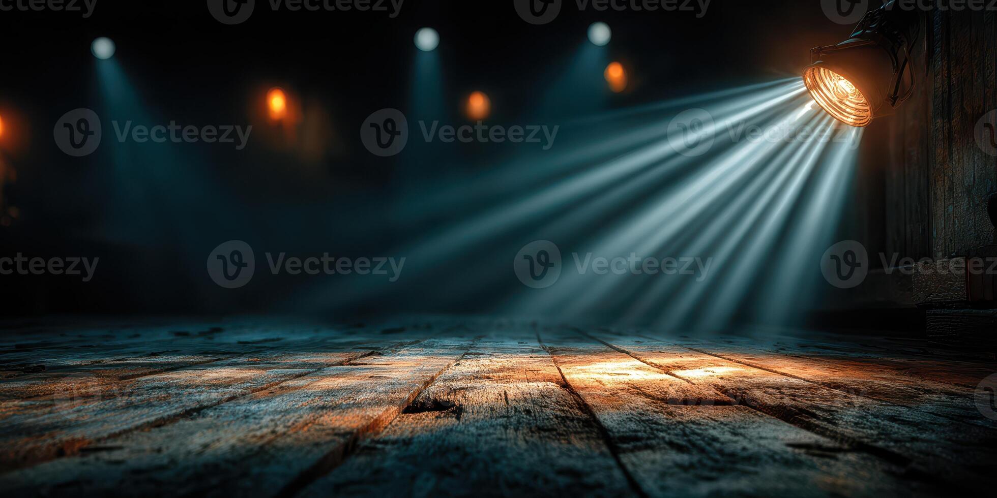 Spotlight illuminates wooden floor in dimly lit venue during an evening performance photo