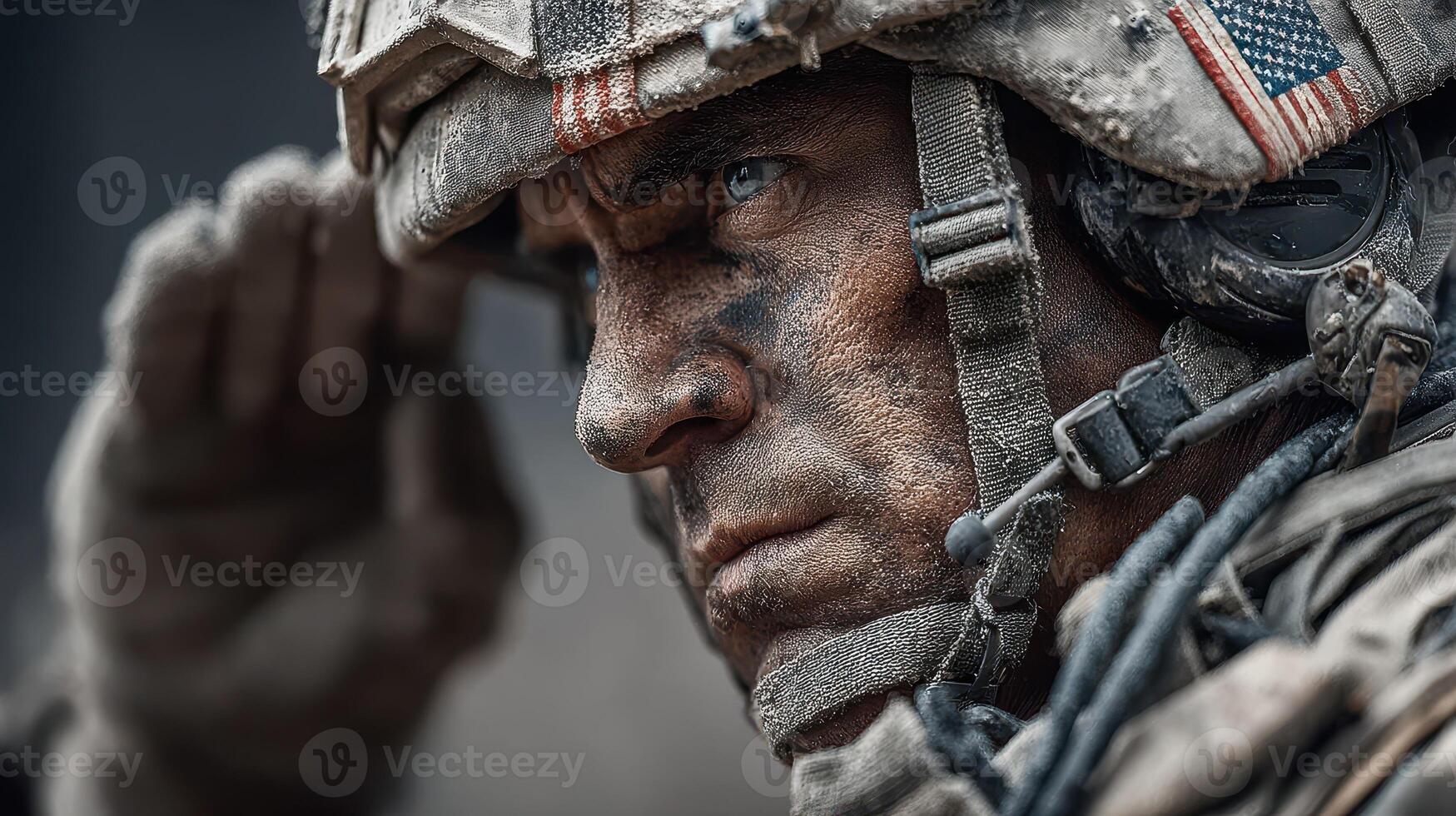 Soldier in full combat gear saluting solemnly during a military operation in an urban environment photo