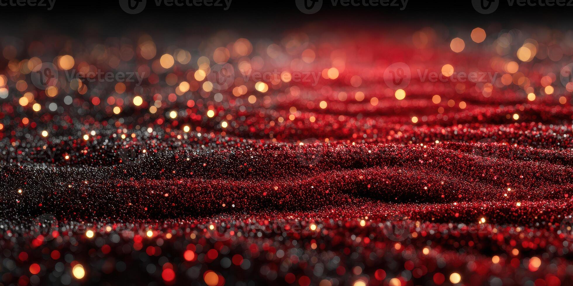 Shimmering tide of red and black particles creates a mesmerizing visual effect in a dark setting photo