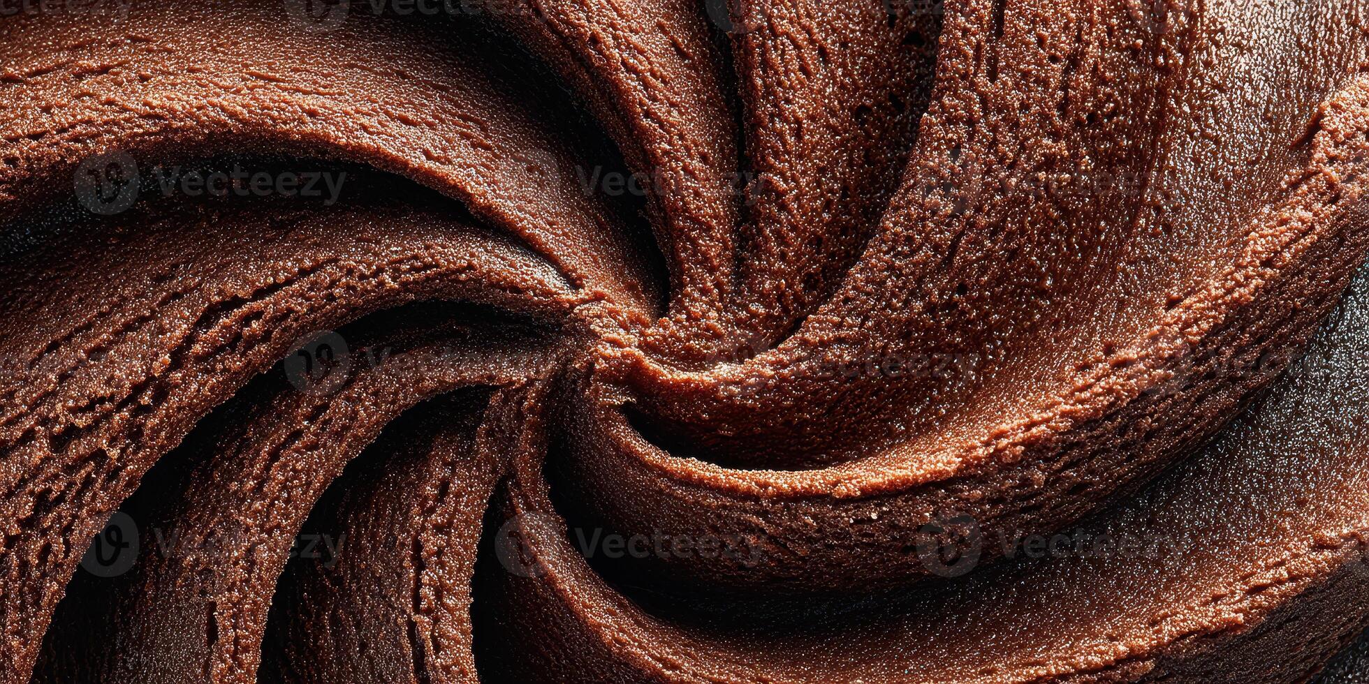 Creamy chocolate swirl showcases rich texture and deep flavor ideal for desserts and confections photo