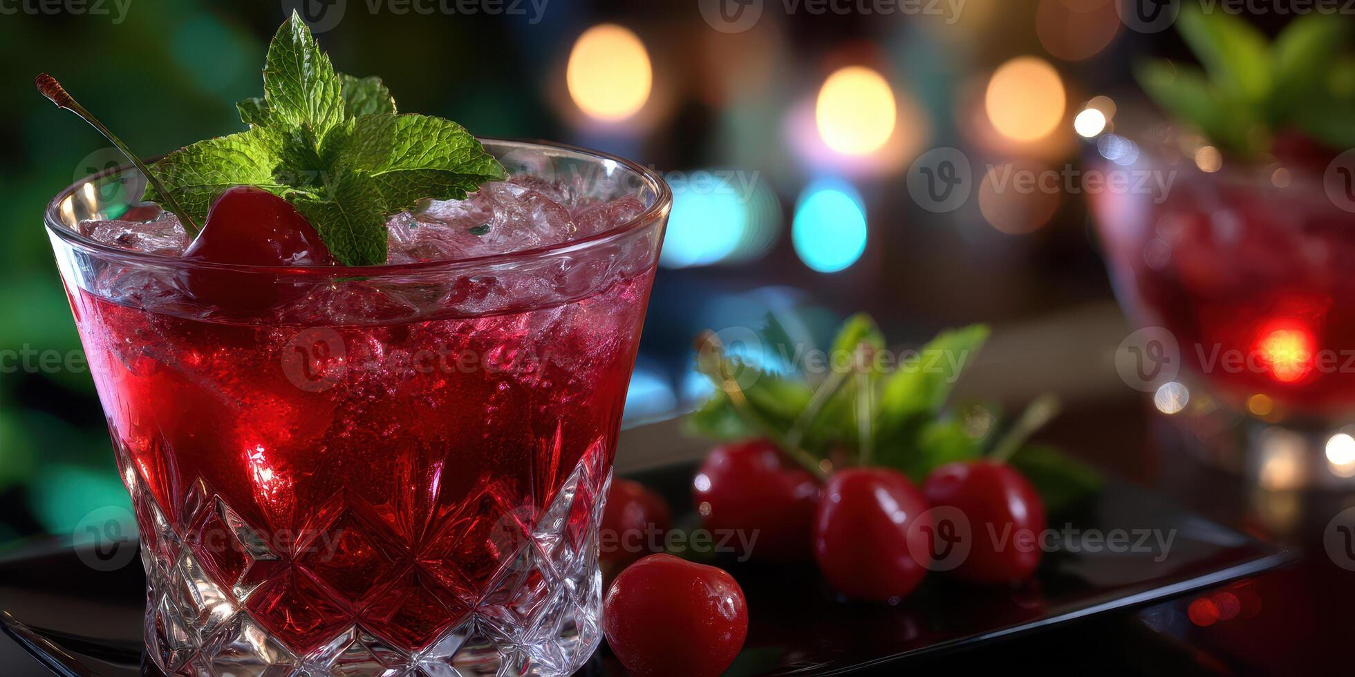 Refreshing red cocktail with cherries and mint served on a dark plate in a lively bar setting at night photo