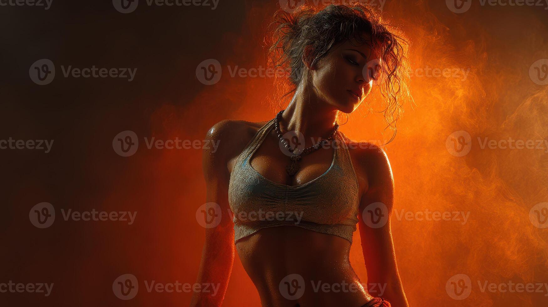 Dynamic dance performance highlights athleticism and artistry during an artistic showcase in a dramatic, illuminated setting photo