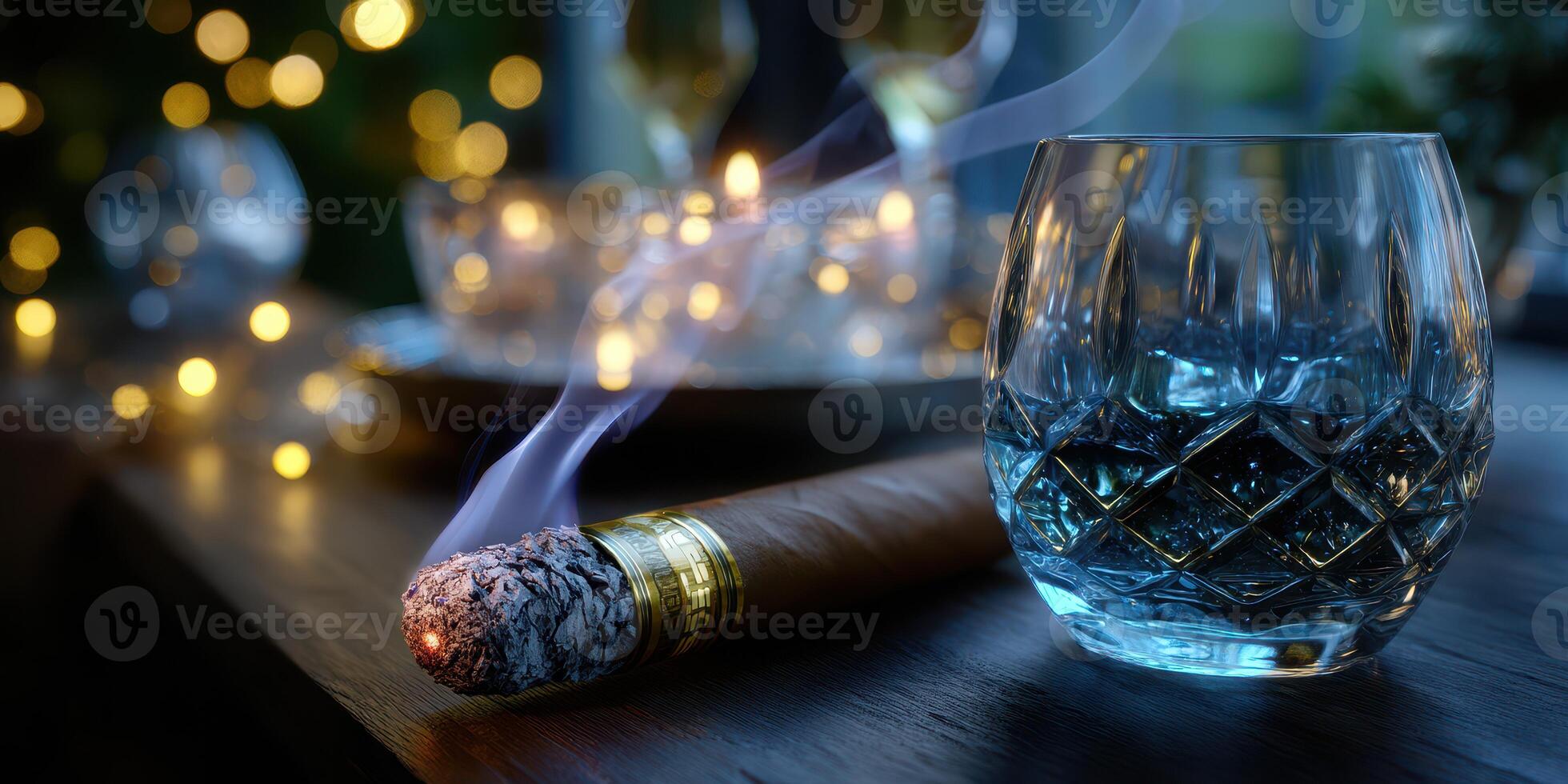Cigar smoke mingles with whiskey on a wooden table during an evening gathering photo