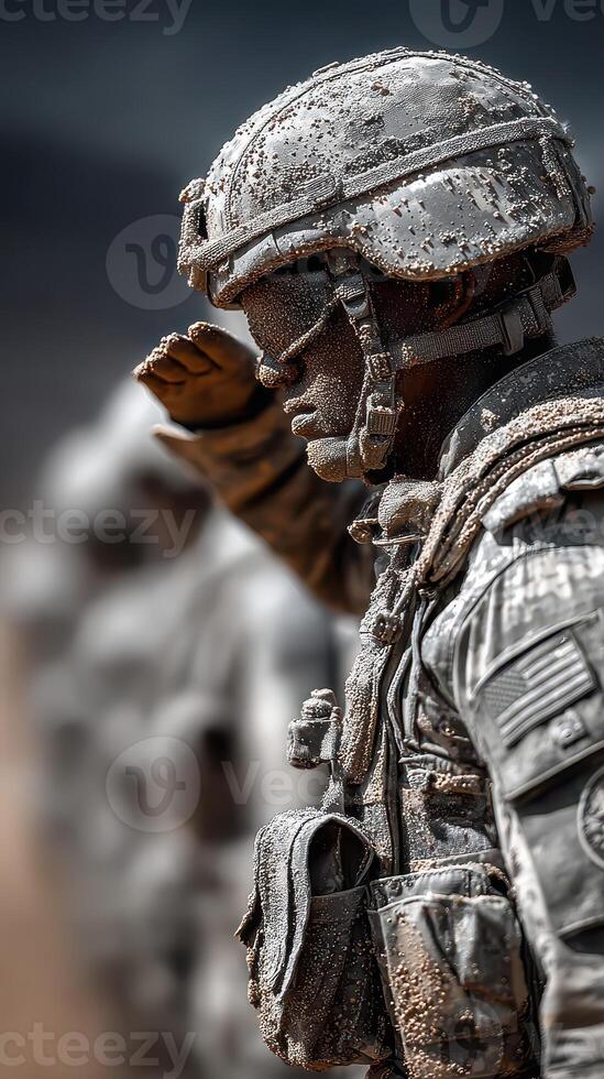 Soldiers stand in salute at military training exercise in dusty terrain during midday photo