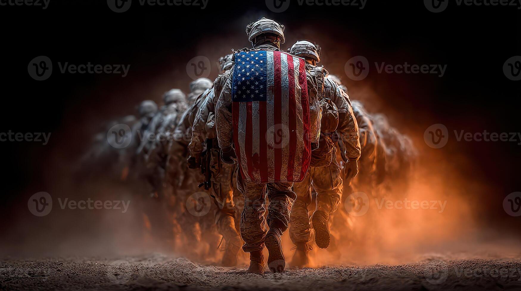 Soldiers march with determination while carrying an American flag shield during a military exercise at dusk photo