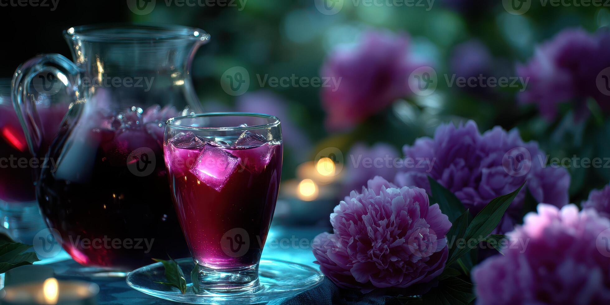 Refreshing beverage served with peony flowers in a serene garden setting during twilight photo