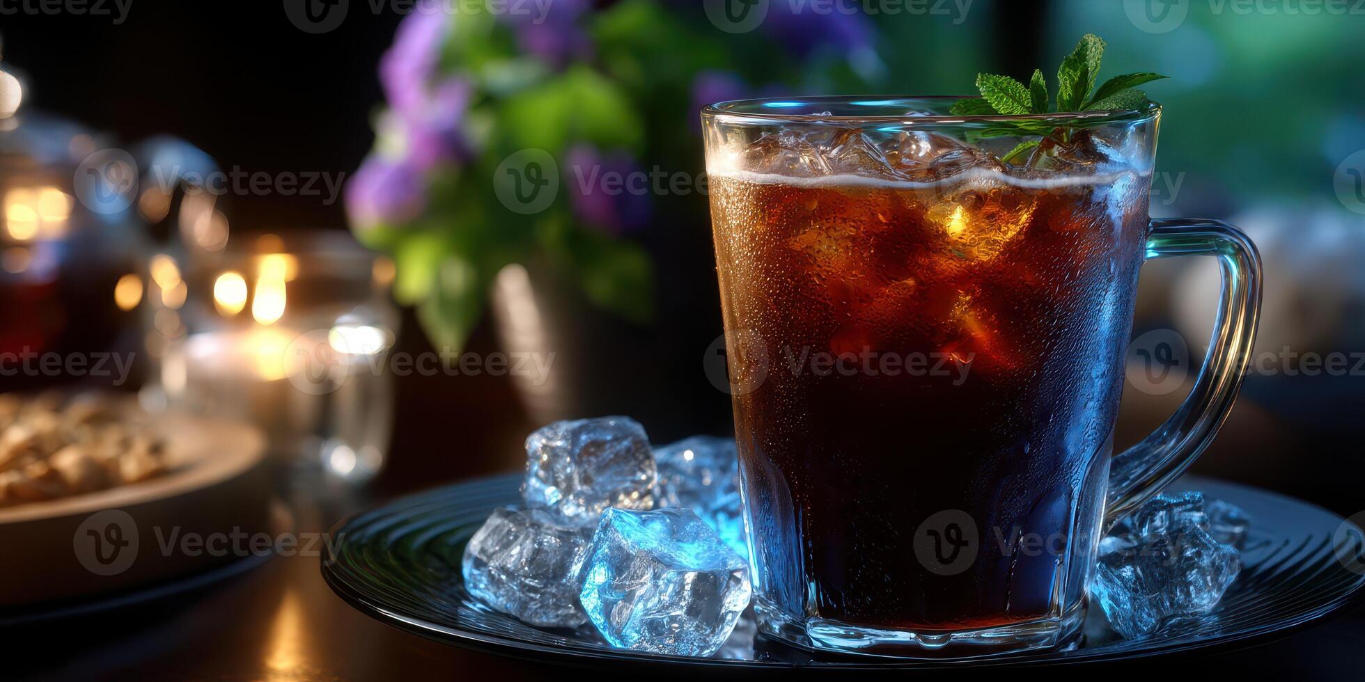 Refreshing ice-cold beverage garnished with mint served on a dark table at a cozy evening gathering photo