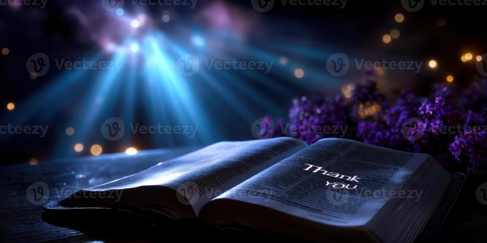 Book open with thank you message illuminated by soft light during the night, creating a serene and peaceful atmosphere photo