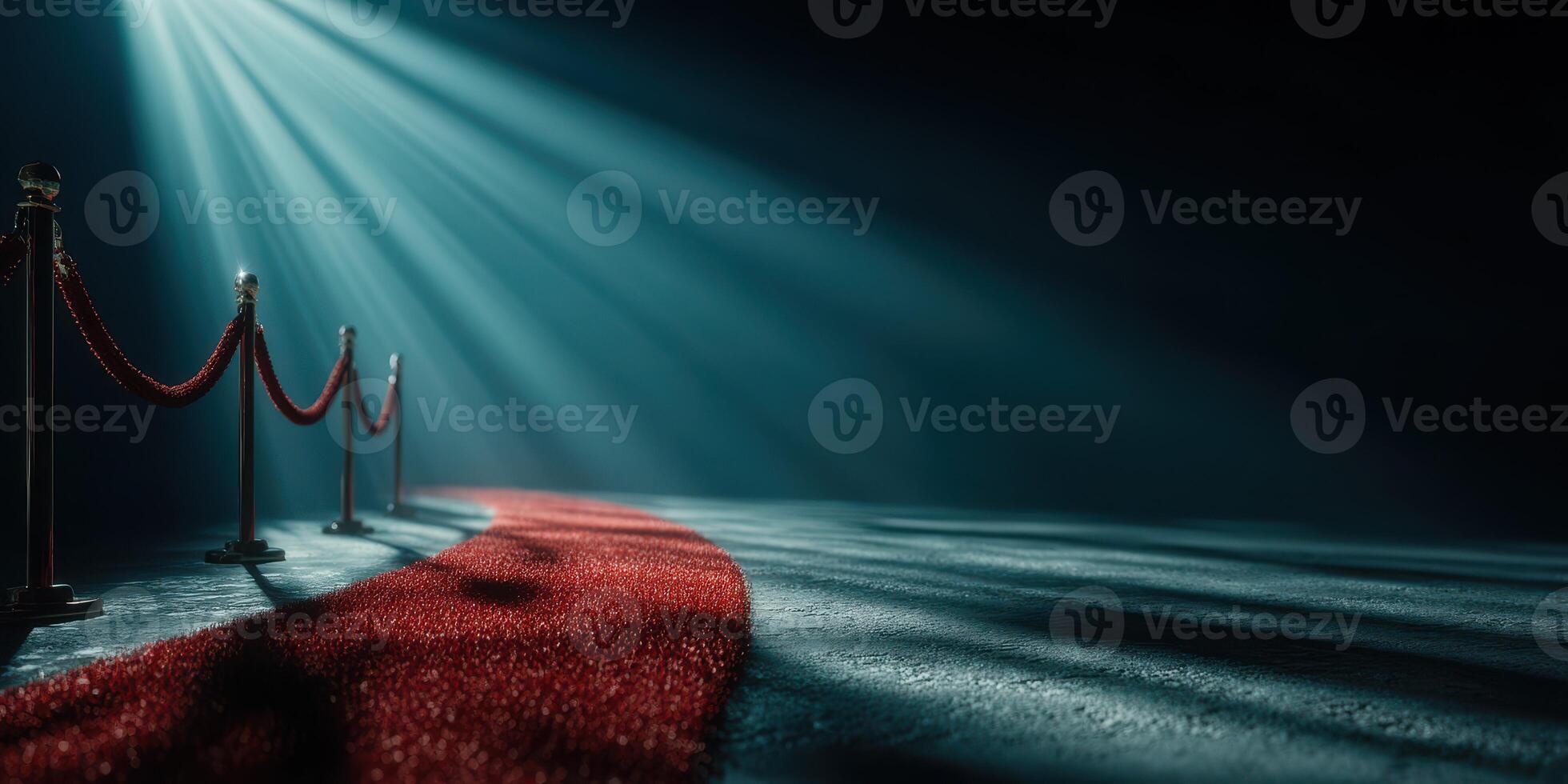 Red carpet entrance illuminated by dramatic light creates an elegant atmosphere for special events and celebrations photo