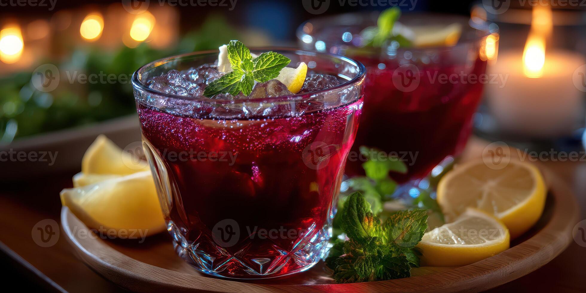 Refreshing berry drinks with lemon and mint served on a wooden tray in a cozy ambient setting during an evening gathering photo