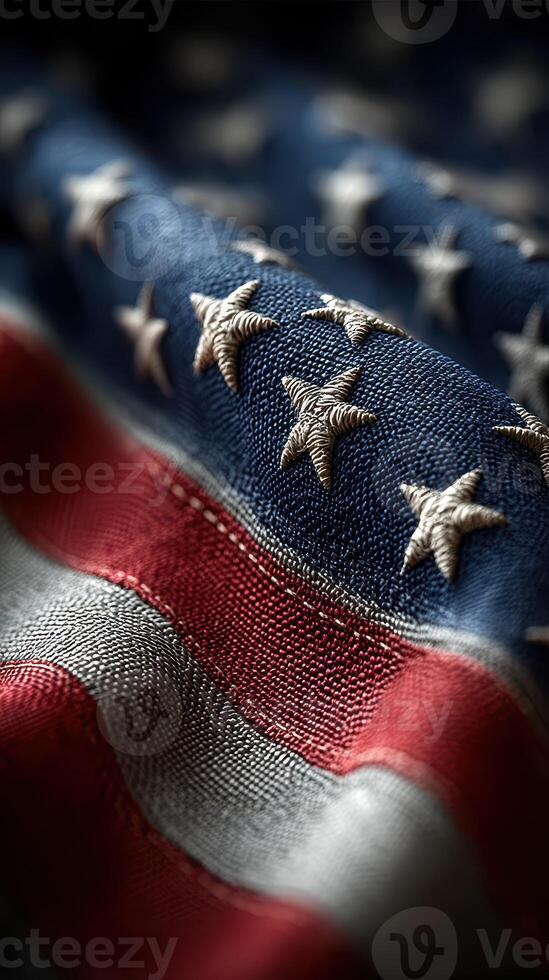 Close up view of an American flag highlighting the detailed stitching and vibrant colors of the stars and stripes photo