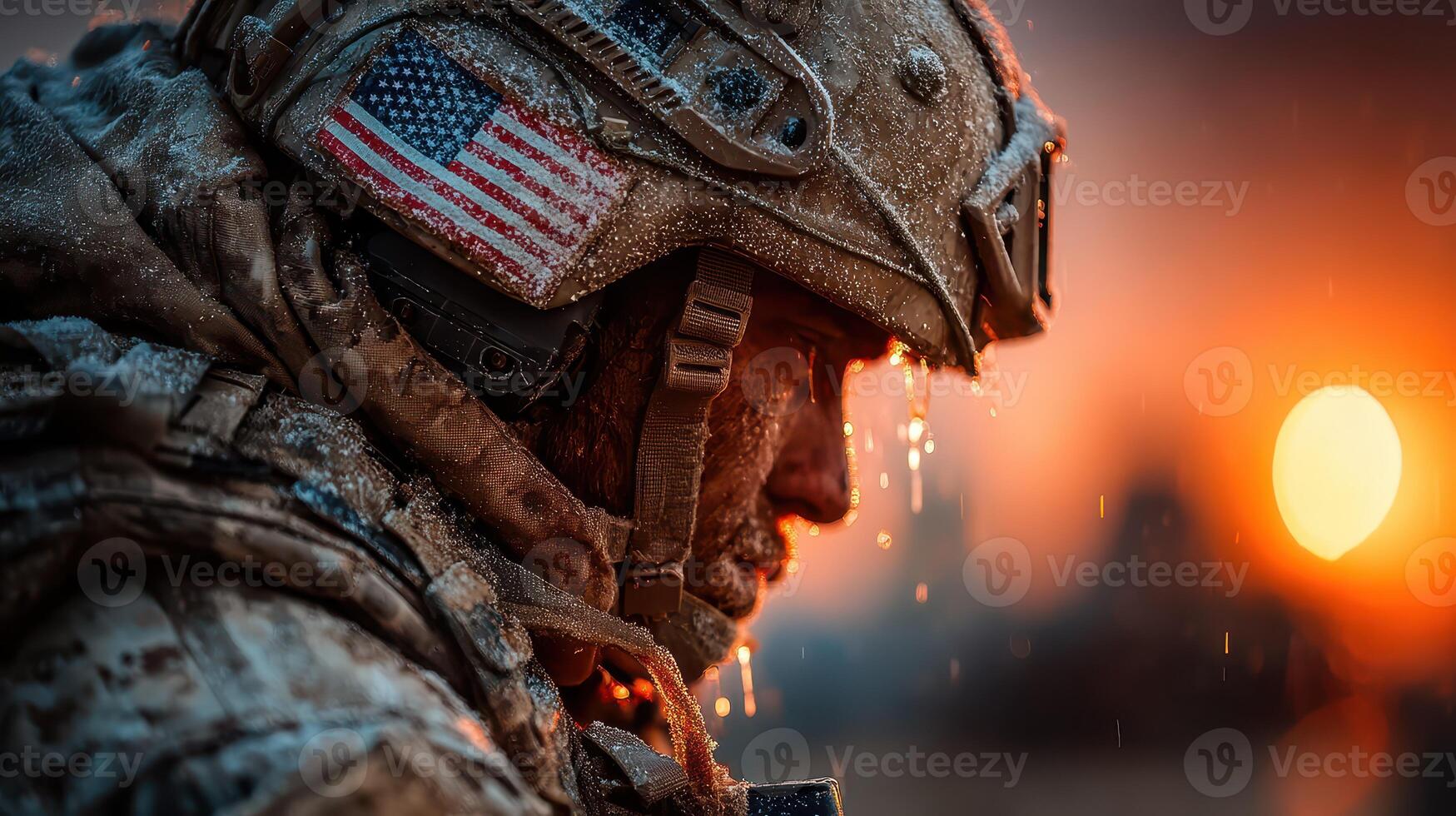 Soldier in icy environment observes sunset while water drips from helmet during military operation photo