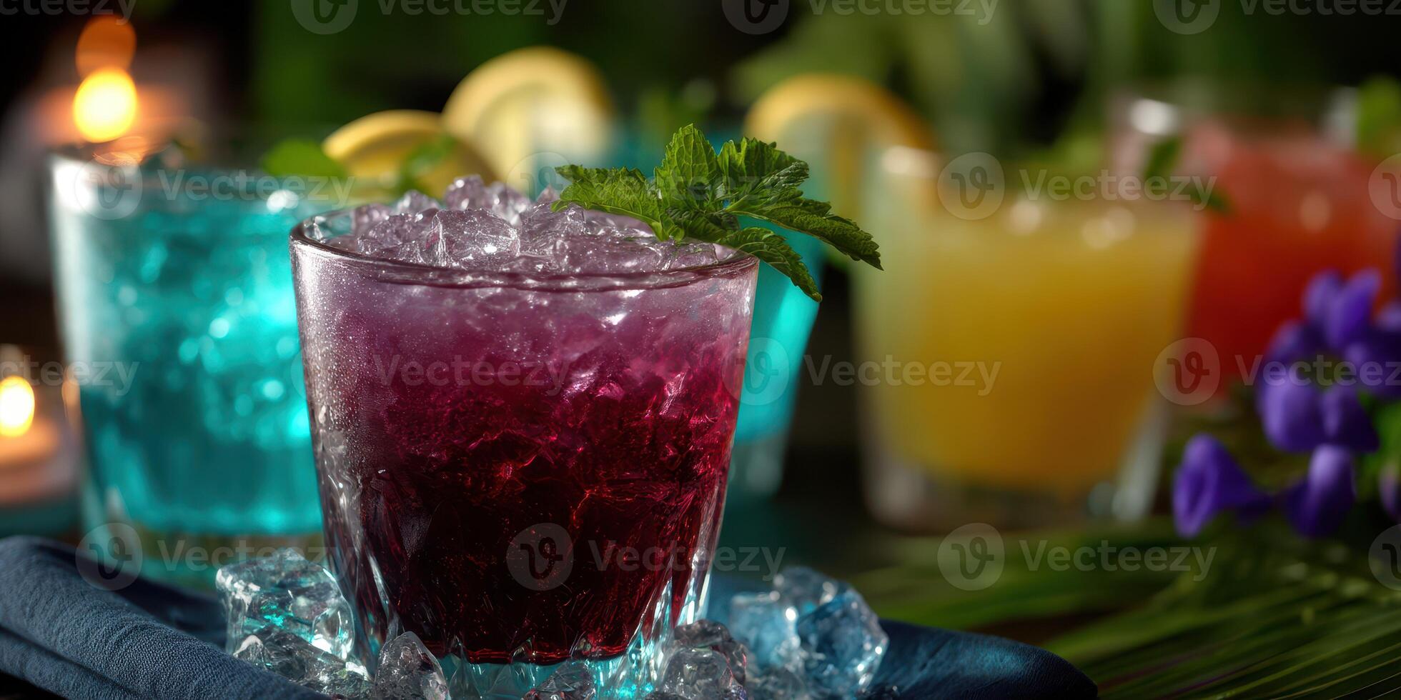 Vibrant cocktails in glasses with ice and garnishes at an outdoor gathering during a warm summer evening photo