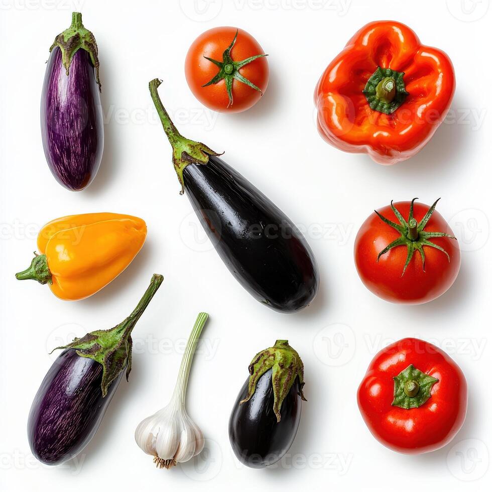 Various vegetables arranged in a circle on a white surface photo