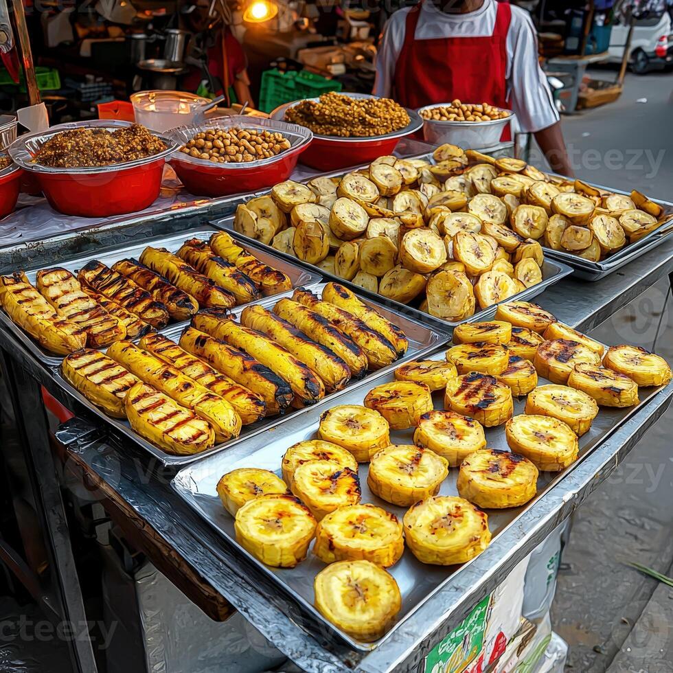 A man is standing in front of a food stand photo