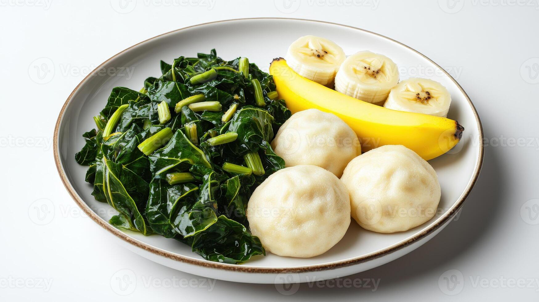 A plate with bananas, dumplings, and greens photo