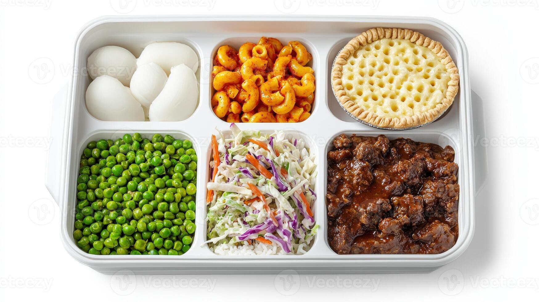 A white container with four compartments containing different foods photo
