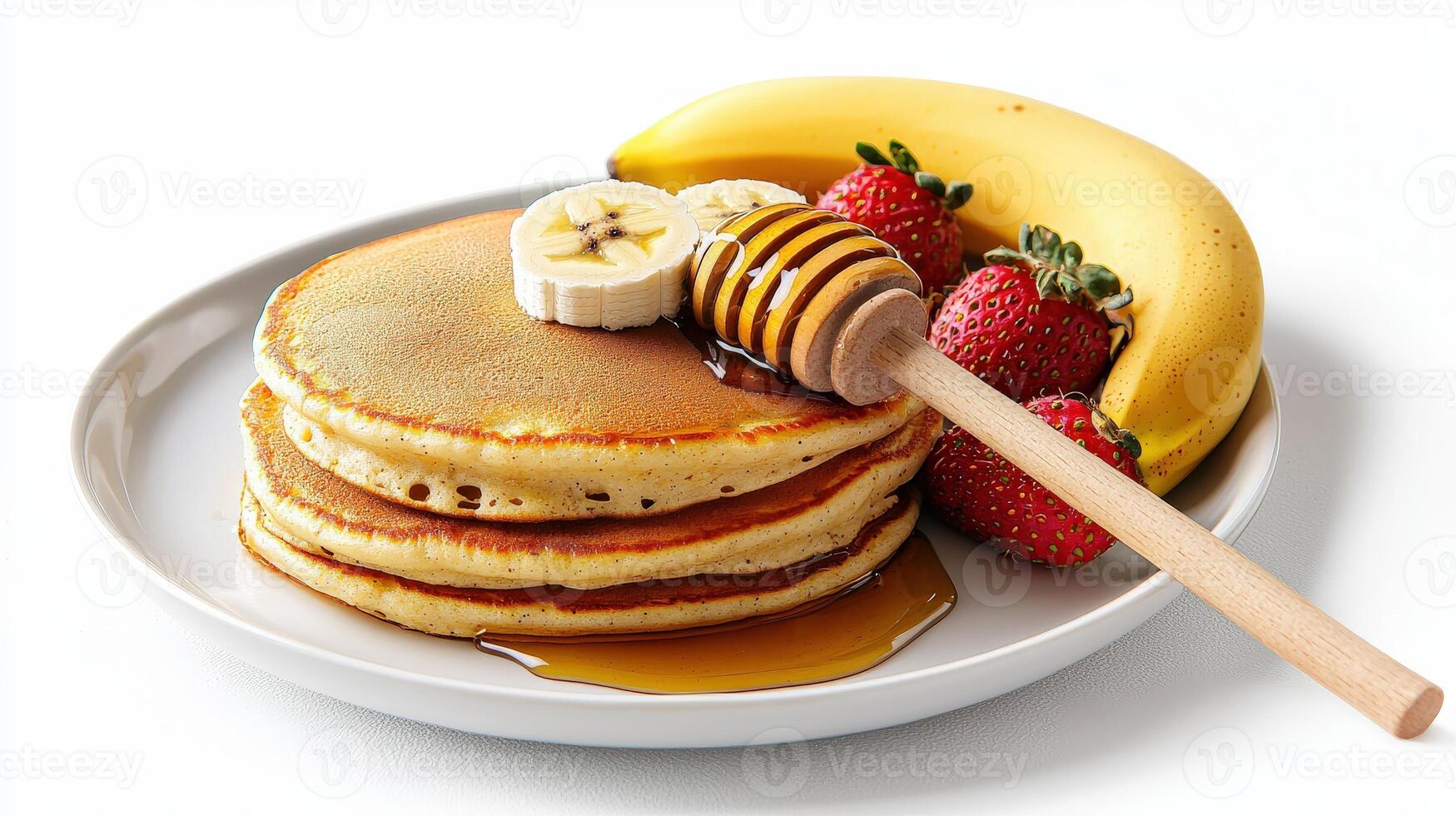 A stack of pancakes with strawberries and bananas photo