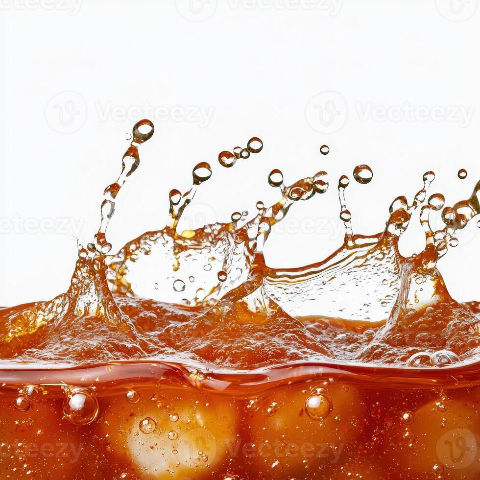 A close up of a soda with bubbles and ice photo