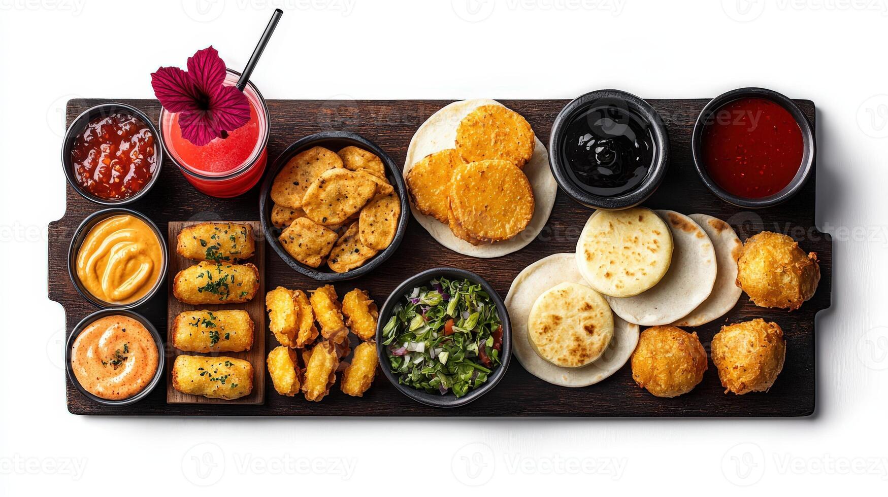 A tray of food with dips and sauces photo