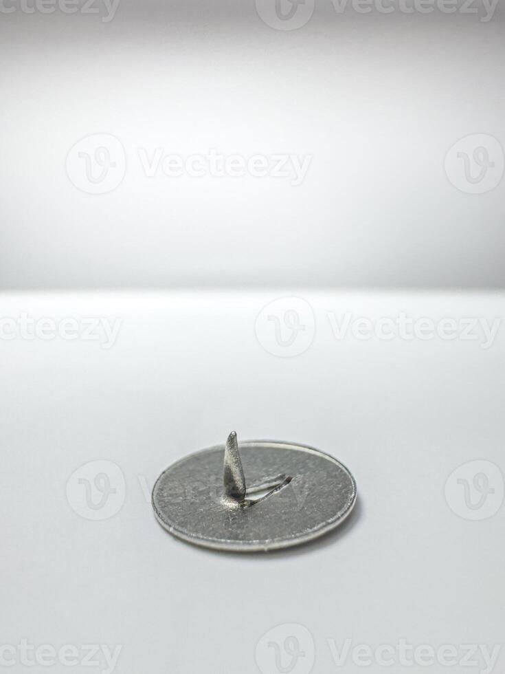 Thumbtacks, highlighting the effects of time and usage. Isolated, copy space photo