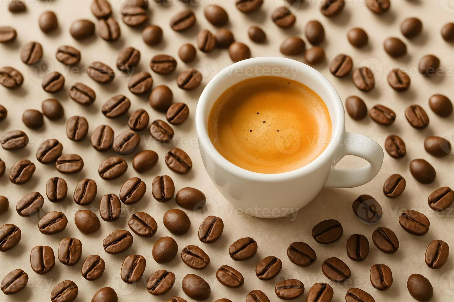 Fresh coffee beans in focus with a blurry ceramic cup of espresso in the background. photo